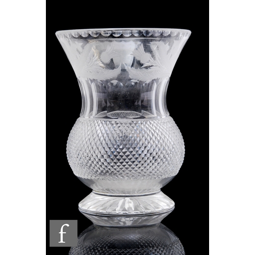 533 - A glass vase of thistle form, engraved with a band of thistles above a strawberry diamond cut body, ... 