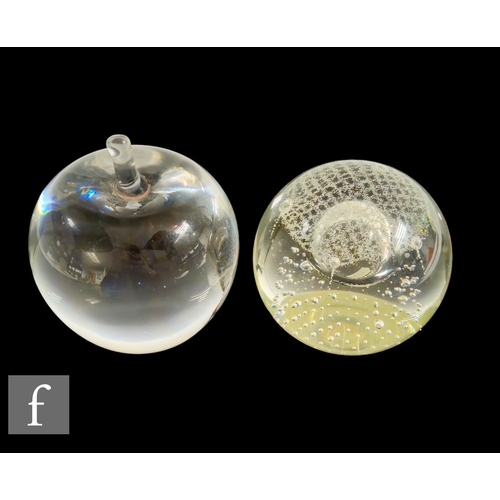 650 - A 20th Century Caithness clear crystal glass paperweight in the 'Silver Rain' pattern, decorated int... 