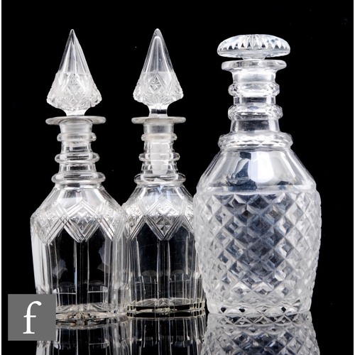 330 - A late Georgian Prussian form decanter with strawberry diamond and slice cut detail below a three ri... 