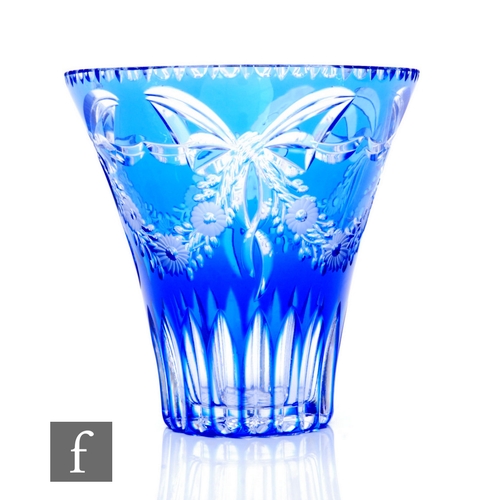 338 - An early 20th Century Stevens & Williams glass vase of flared form, blue cased over clear and fl... 