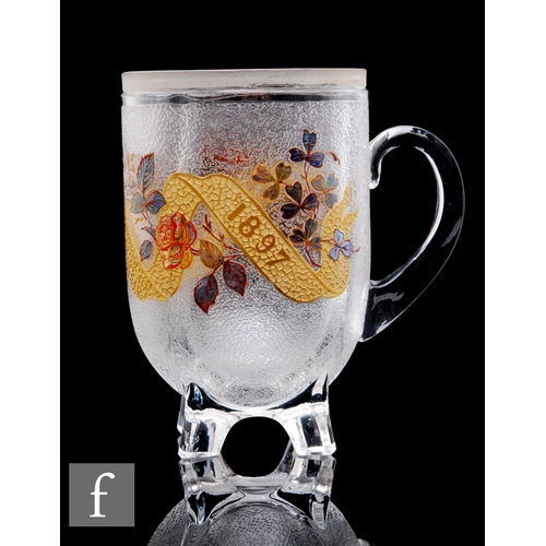 434 - A late 19th Century Stevens & Williams Grotesque handled tankard with an acid cut commemorative ... 