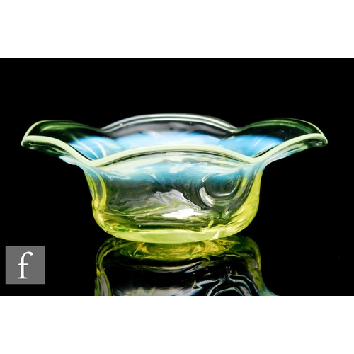 449 - A late 19th to early 20th Century Vaseline small glass bowl, of circular section with wavy rim, all ... 