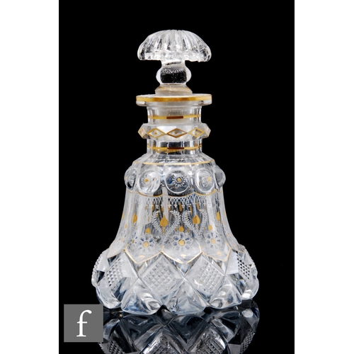 459 - A 19th Century Bohemian Biedermeier scent bottle with diamond cut body with fine gilded decoration, ... 