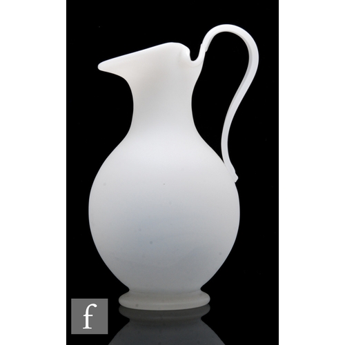 468 - A 19th Century alabaster ware jug, probably Richardsons, of footed ovoid form with integral neck and... 