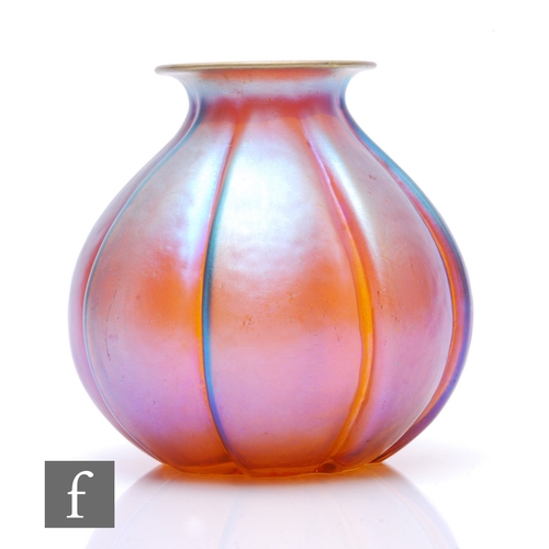 487 - A 1930s WMF Ikora glass vase, of lobed ovoid form and everted neck, all in a petrol iridescent over ... 