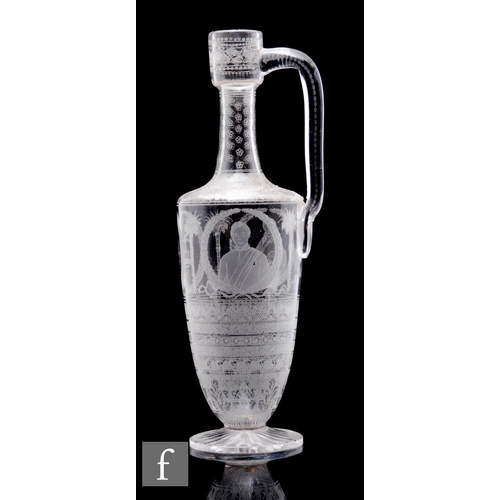 515 - A late 19th Century Stourbridge clear crystal jug of slender footed form with collar neck, the body ... 