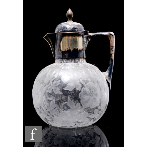 461 - A late 19th Century clear crystal claret jug by Stevens & Williams, of spherical form, polished ... 