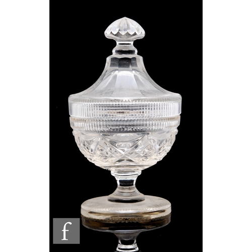 432 - A 19th Century clear crystal covered sweetmeat dish with knopped swept cover above a cut base with c... 