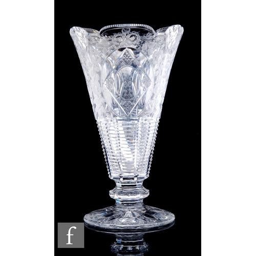 437 - A large Stourbridge crystal glass vase of footed conical form with a shaped upper rim, the body poli... 