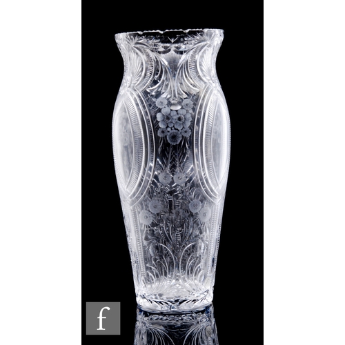 438 - A large early 20th Century Stourbridge clear crystal vase of swollen sleeve form, heavily polished i... 