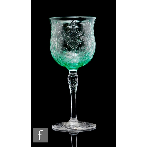 490 - An early 20th Century Thomas Webb & Sons clear crystal wine glass, the green tinted ovoid bowl w... 