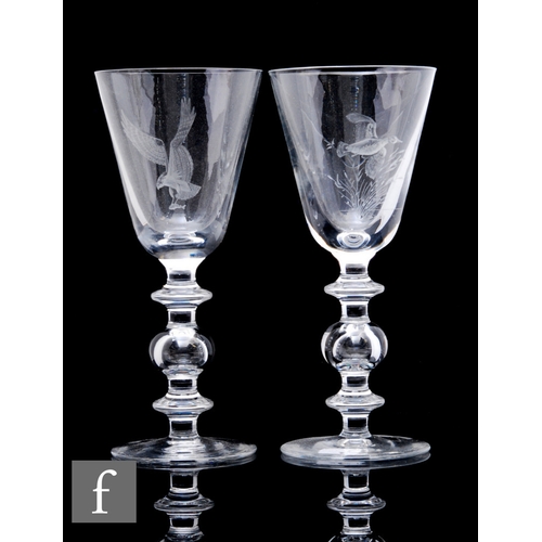 572 - A pair of later 20th Century crystal wine goblets by Cumbria Crystal in the 18th Century taste, each... 