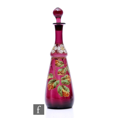 573 - A late 19th Century continental Art Nouveau decanter in the manner of Mont Joye & Cie, the taper... 