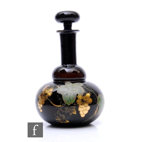 583 - An early 20th Century continental decanter of compressed globe and shaft form, the body hand enamell... 