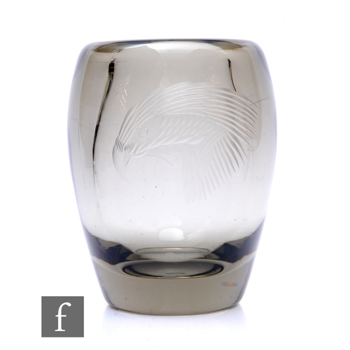 584A - A 1930s Swedish crystal glass vase by Stromberg, the heavy walled swollen ovoid body engraved with a... 