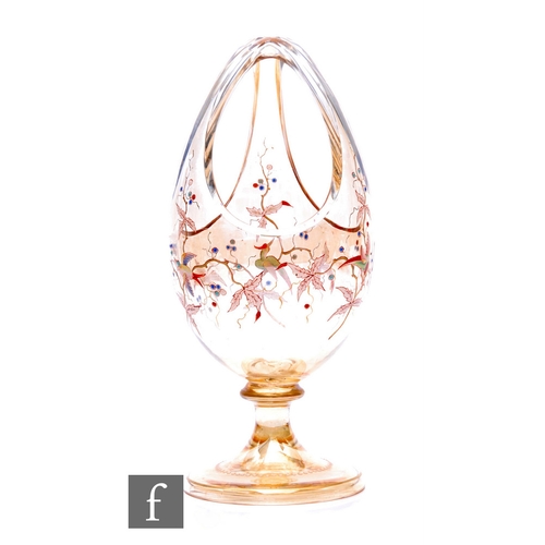 585 - A late 19th Century Bohemian crystal glass vase by Harrach, the ovoid body slice cut with three oval... 