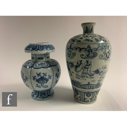 30 - Two Chinese blue and white vases, one of pedestal form with segmented panels, detailed with lotus fl... 