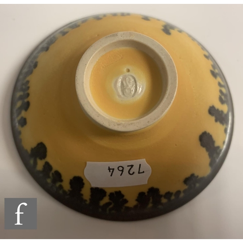 82 - A small later 20th Century Studio Pottery porcelain bowl in the manner of Dame Lucie Rie, the small ... 