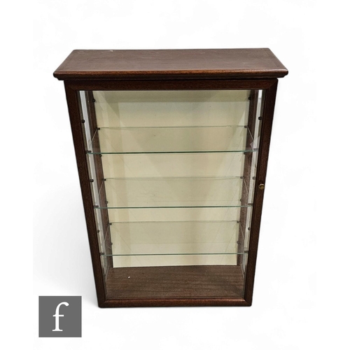 1037 - A small mahogany glazed wall display cabinet, 62cm x 40cm.