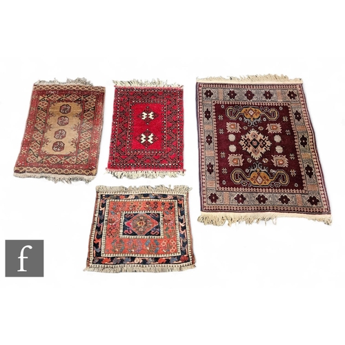 1070 - A Kayam prayer mat and three other rugs. (4)