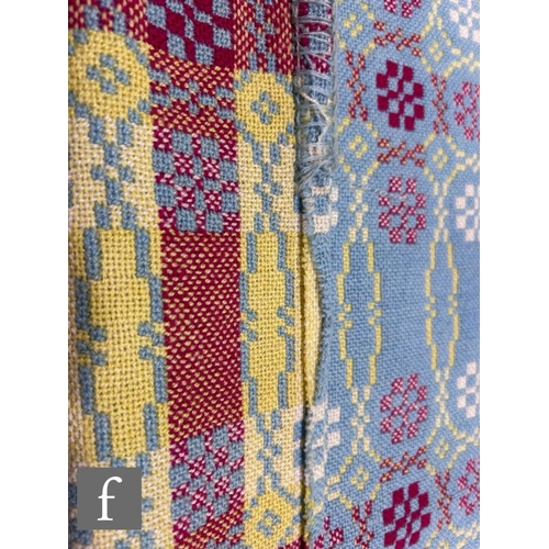 864 - A vintage woollen Welsh tapestry pale blue, yellow and deep pink fringed edge blanket or carthen, me... 