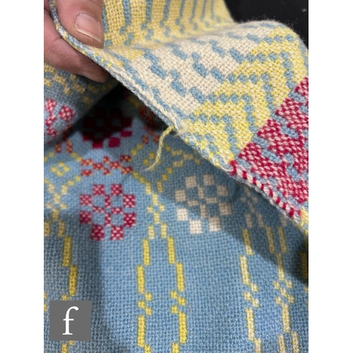 864 - A vintage woollen Welsh tapestry pale blue, yellow and deep pink fringed edge blanket or carthen, me... 