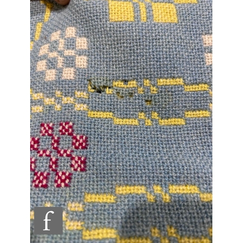 864 - A vintage woollen Welsh tapestry pale blue, yellow and deep pink fringed edge blanket or carthen, me... 