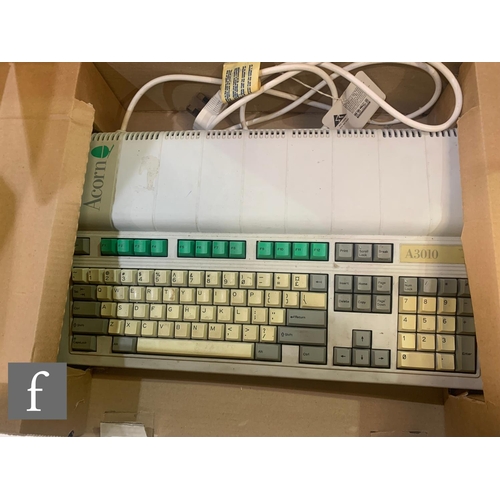 853 - An early 1990s Acorn A3010 computer, including monitor, keyboard, mouse, instruction manuals with or... 