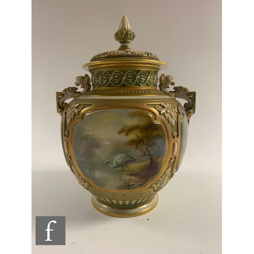 201 - An early 20th Century Royal Worcester Hadley shape pomander and cover, the footed ovoid body with re... 