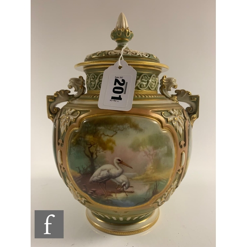 201 - An early 20th Century Royal Worcester Hadley shape pomander and cover, the footed ovoid body with re... 