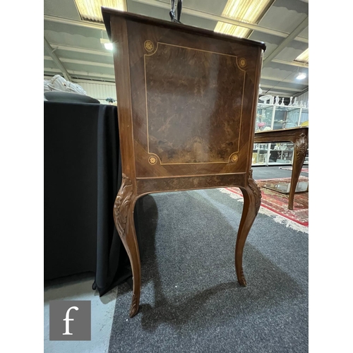 1002 - A 20th Century Italian figured walnut dining room suite, comprising a serpentine front sideboard on ... 