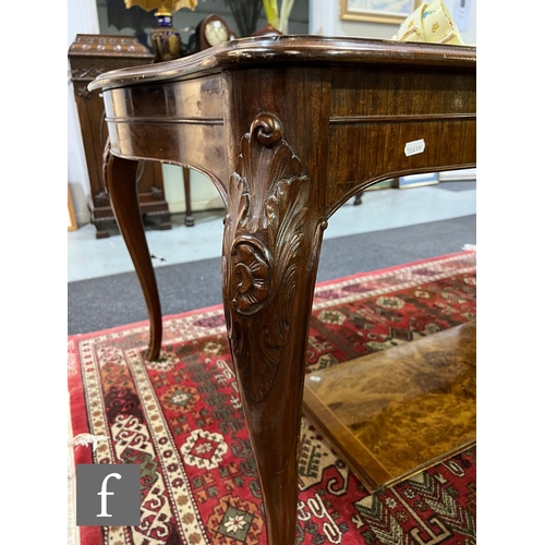 1002 - A 20th Century Italian figured walnut dining room suite, comprising a serpentine front sideboard on ... 