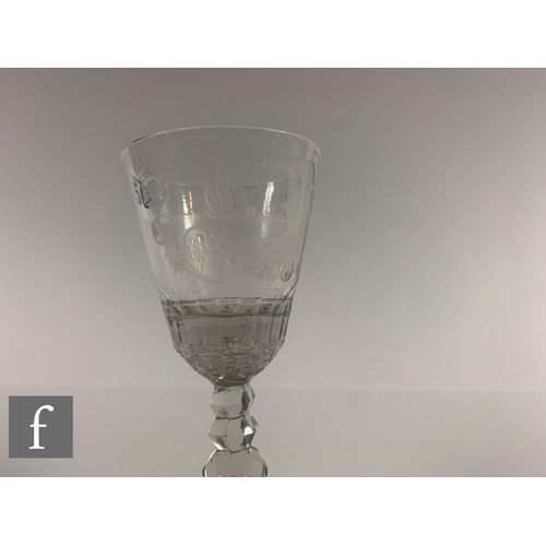 506 - A 19th Century clear crystal drinking glass, the round funnel bowl above a multi knopped facet stem ... 