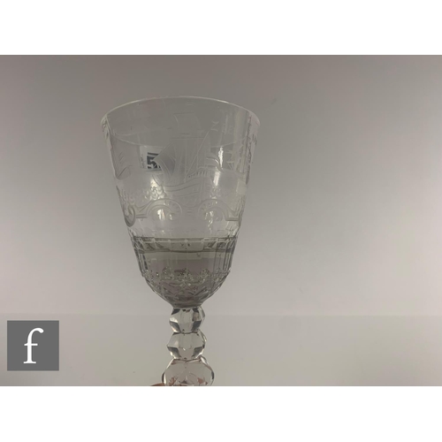 506 - A 19th Century clear crystal drinking glass, the round funnel bowl above a multi knopped facet stem ... 