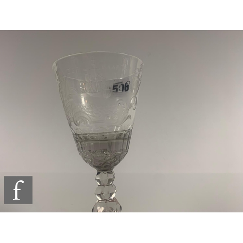 506 - A 19th Century clear crystal drinking glass, the round funnel bowl above a multi knopped facet stem ... 