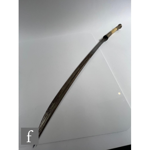 739 - An early 20th Century Indonesian sword with brass bamboo scabbard and part bone hilt, blade 61cm, an... 