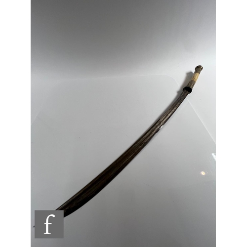 739 - An early 20th Century Indonesian sword with brass bamboo scabbard and part bone hilt, blade 61cm, an... 