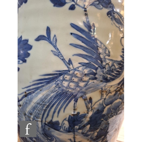 22 - A Chinese 19th to 20th Century blue and white vase of rounded ovoid form, rising to a high neck with... 