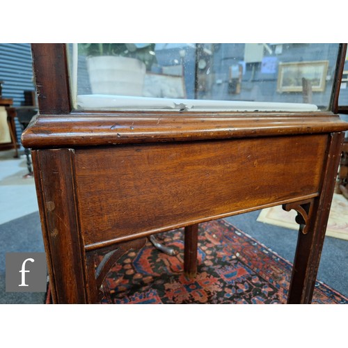 1042 - An Edwardian mahogany floorstanding exhibition style display cabinet, the domed top with four urn sp... 