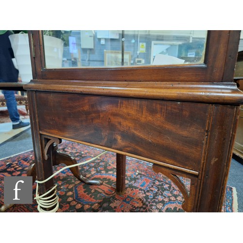 1042 - An Edwardian mahogany floorstanding exhibition style display cabinet, the domed top with four urn sp... 