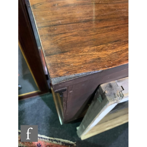 1043 - A pair of small William IV rosewood open bookcases, fixed shelfs below a moulded edge top flanked by... 