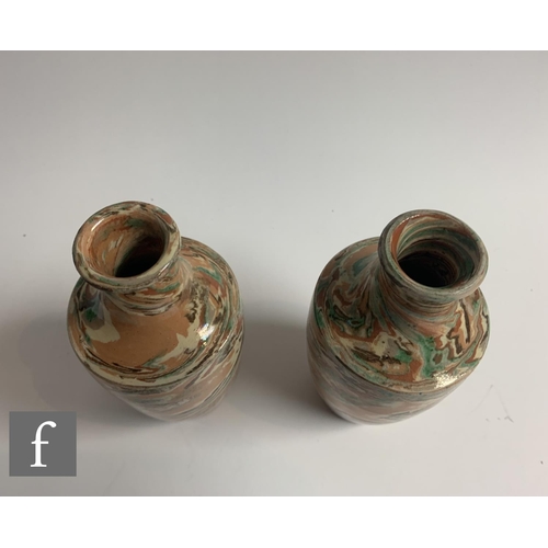 246 - A pair of late 19th Pichon Agateware vases of shouldered ovoid form with drawn collar necks, decorat... 