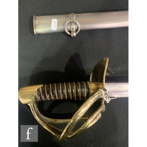 742 - An early 19th Century French cuirassier officer's sword, 38 inch blade, pierced brass hilt and guard... 