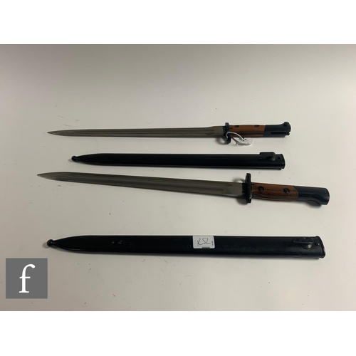 757 - Three German Mauser bayonets and scabbards, a similar Czech bayonet and scabbard with leather holste... 