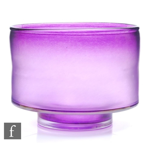 586 - A continental, possibly studio, glass bowl of footed cylindrical form, decorated in a purple iridesc... 