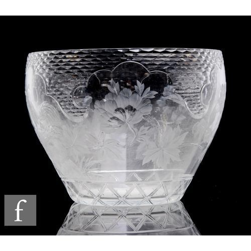 352 - An Edwardian clear crystal bowl by Stevens & Williams, the bowl cut and engraved with a cockerel... 