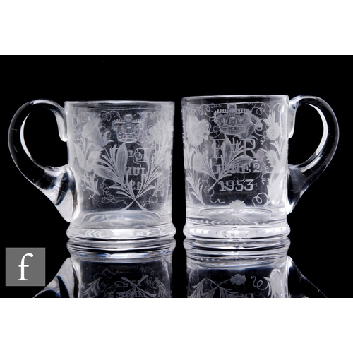 376 - A pair of 1953 Stourbridge crystal commemorative glasses engraved with the emblems of the British Is... 