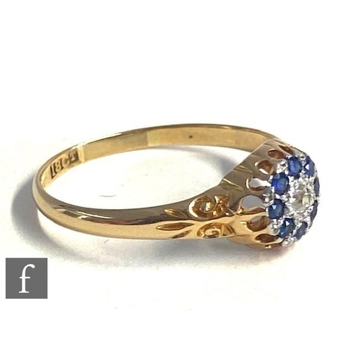 45 - An early 20th Century 18ct sapphire and diamond cluster ring, central old diamond within a border of... 