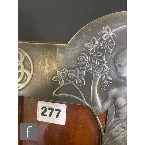 271 - An WMF (Catalogue number 32/2), Art Nouveau polished pewter double photograph frame with a central s... 