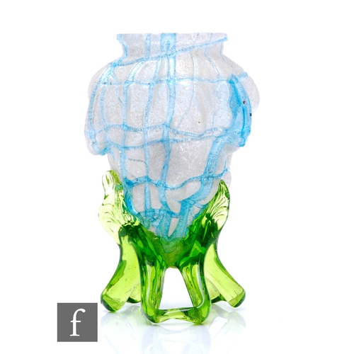 641 - An early 20th Century Kralik glass vase in the form of a shell, the body decorated with random blue ... 